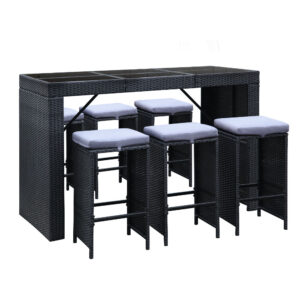 Gardeon 7 piece outdoor wicker bar set black with six stools and gray cushions arranged around a glass top table on a timber patio.