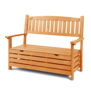 Gardeon 2-seater wooden outdoor storage bench in a natural timber finish sitting on a paved backyard patio.