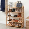 Artiss 5 Tier Bamboo Shoe Rack Storage Organiser Pine Filled With Shoes Against A Hallway Wall.