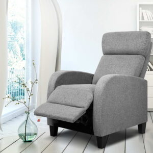 Artiss fabric reclining armchair in textured grey linen styled upright in a contemporary living room nook.