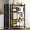 Carla Home 4 Tier Foldable Storage Shelf with Wheels stocked with kitchen appliances and pantry jars