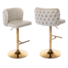 2x Faux Leather Golden Base Swivel Bar Stools Beige set next to kitchen counter